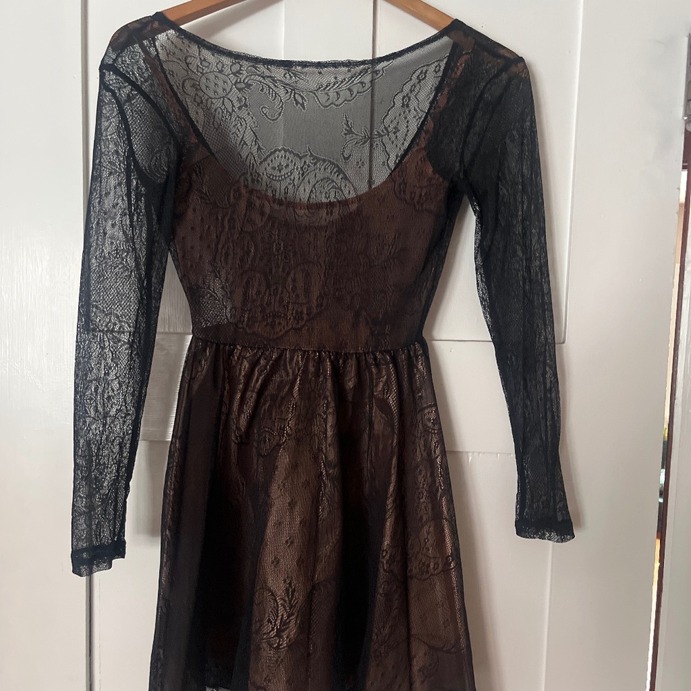 Lace ballet back long sleeve cocktail dress